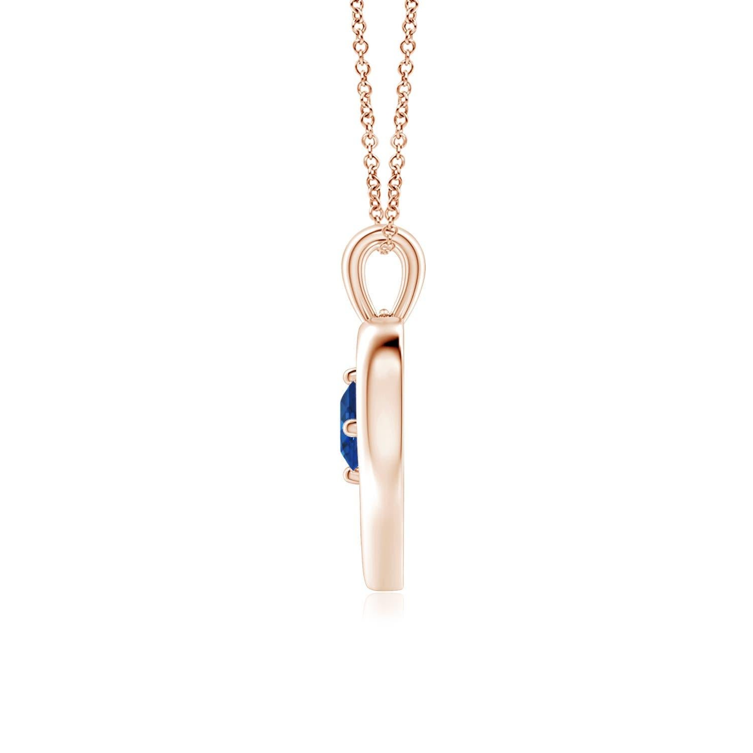 Ce resplendissant pendentif à cœur ouvert en or rose 14k serti de saphirs est à la fois simple et magnifique. L'agréable pierre précieuse bleue semble hypnotisante en combinaison avec le cadre lustré en forme de cœur ouvert.
Le saphir bleu est la