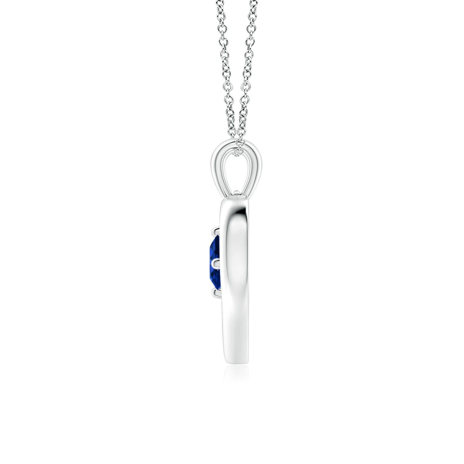 Ce resplendissant pendentif à cœur ouvert en or blanc 14k serti de saphirs est à la fois simple et magnifique. L'agréable pierre précieuse bleue semble hypnotisante en combinaison avec le cadre lustré en forme de cœur ouvert.
Le saphir bleu est la