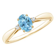 Anello Angara in Topazio Blu Svizzero Naturale con gambo affusolato e diamanti in oro 14K