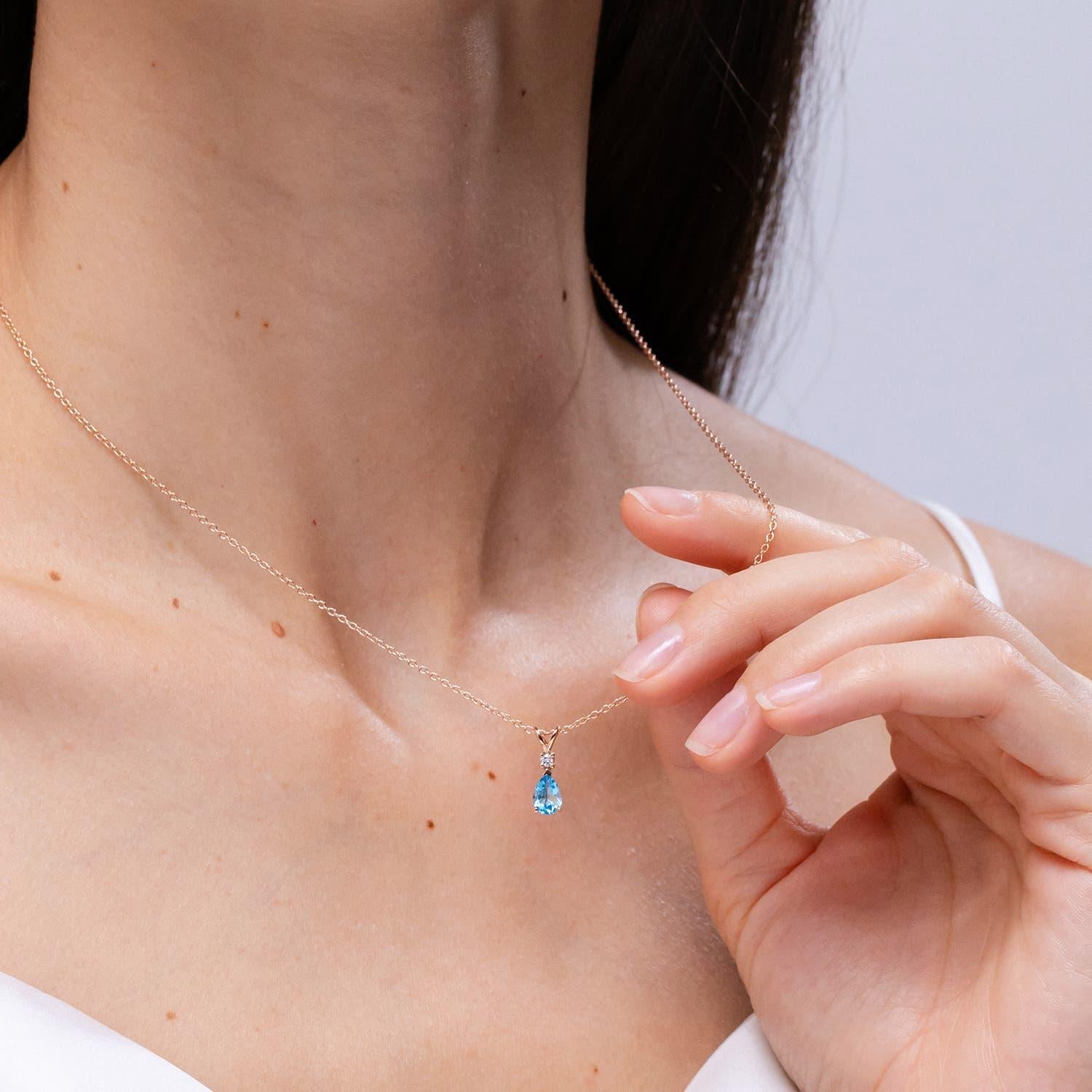 Pear Cut Angara Natural Swiss Blue Topaz Teardrop Pendant with Diamond in 14K Solid Gold For Sale