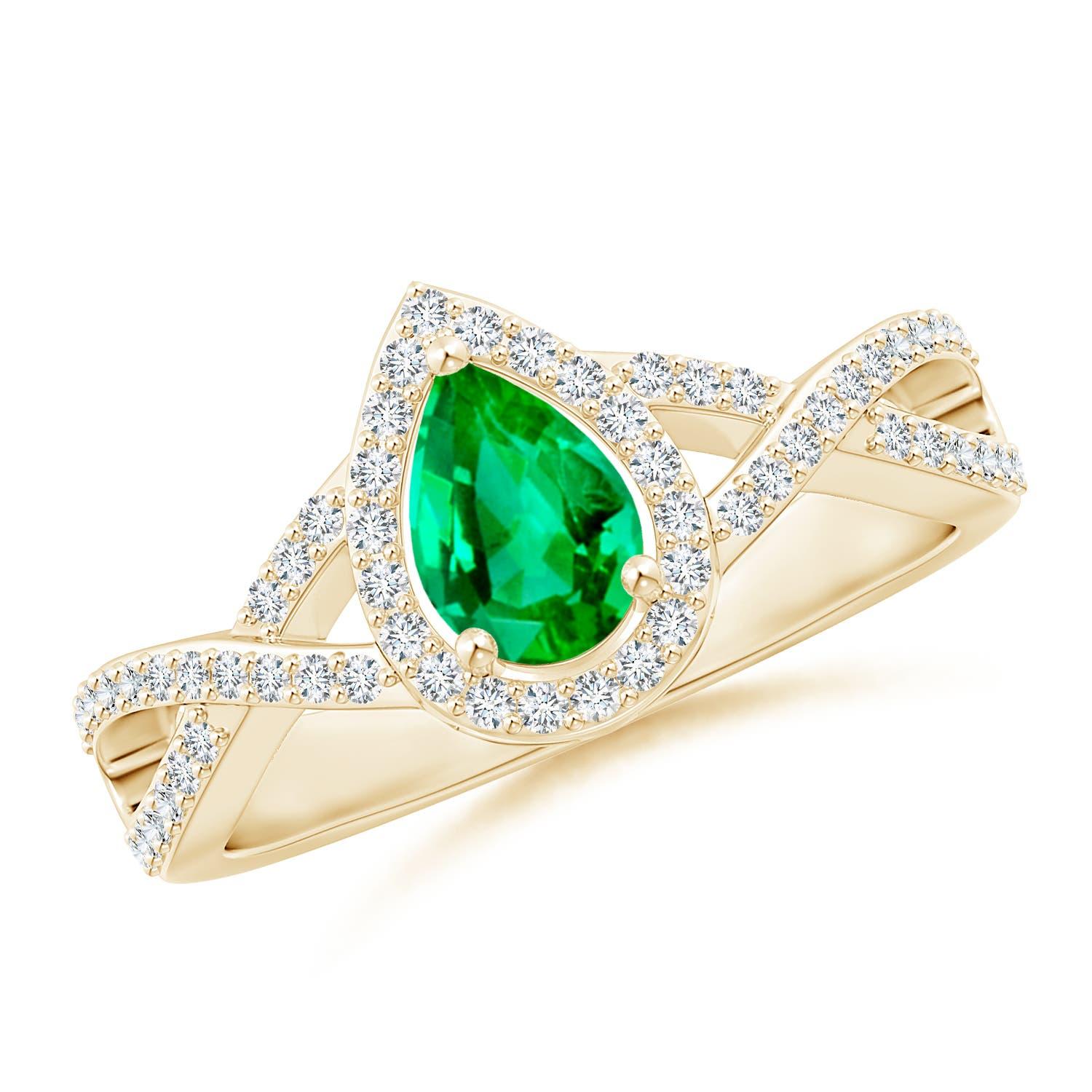 Anillo Angara de esmeralda pera natural de caña torcida con halo de diamantes en oro macizo de 14 quilates en venta 1