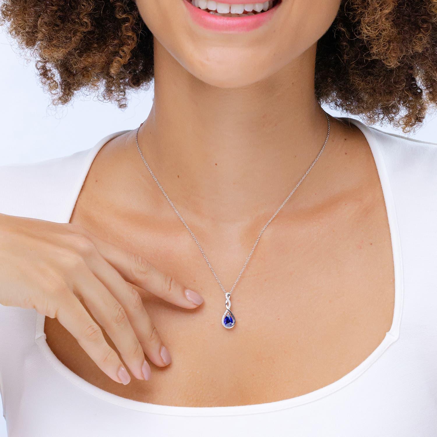 Angara Natural Twisted Unendlichkeit 1,15 ct blauer Saphir Anhänger in 14K massivem Gold (Moderne) im Angebot