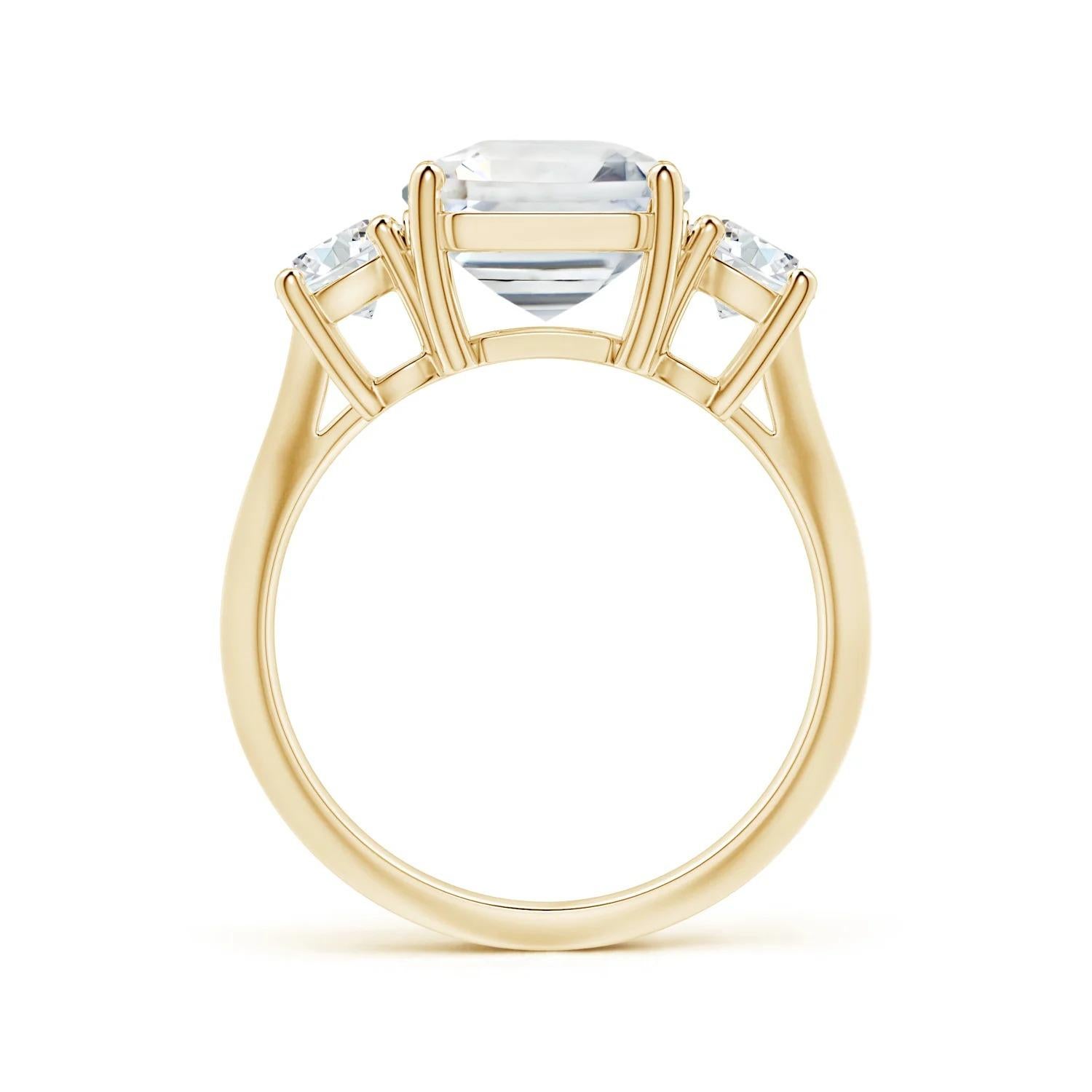 For Sale:  Angara Three Stone Gia Certified Emerald-Cut White Sapphire Ring in Yellow Gold 2
