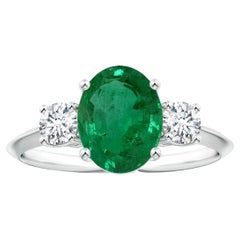 ANGARA Three Stone GIA Certified Emerald Shank Ring in Platinum with Diamonds