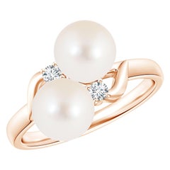 Anello Angara con due pietre di perle d'acqua dolce coltivate e diamante in oro massiccio 14 carati