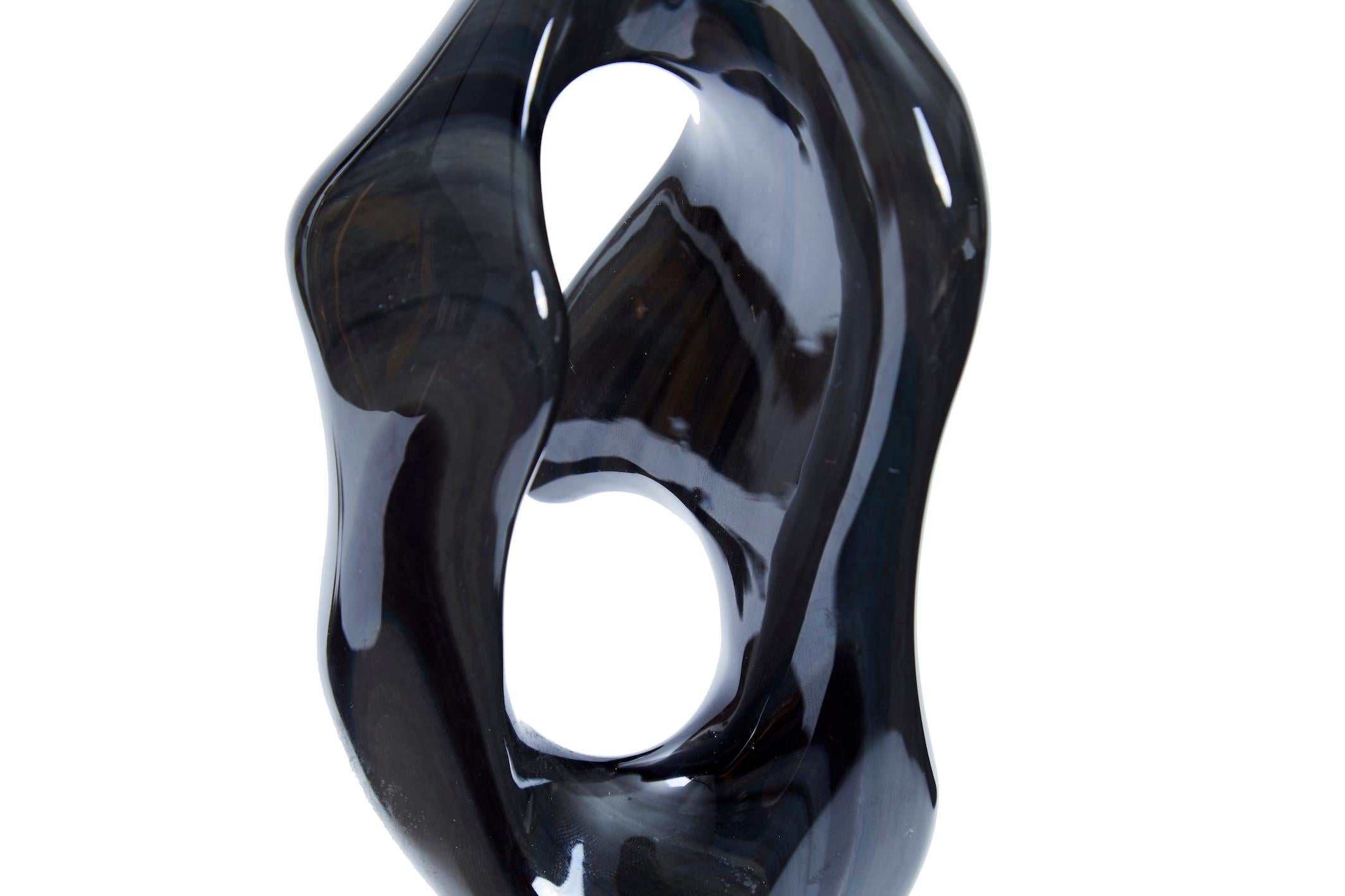 MASTERPIECE

A modern piece made of Obsidian Stone finely polished with sandpaper.

LISTING
===================================
1 Obsidian Sculputre 
===================================
DIMENSIONS
===================================

6