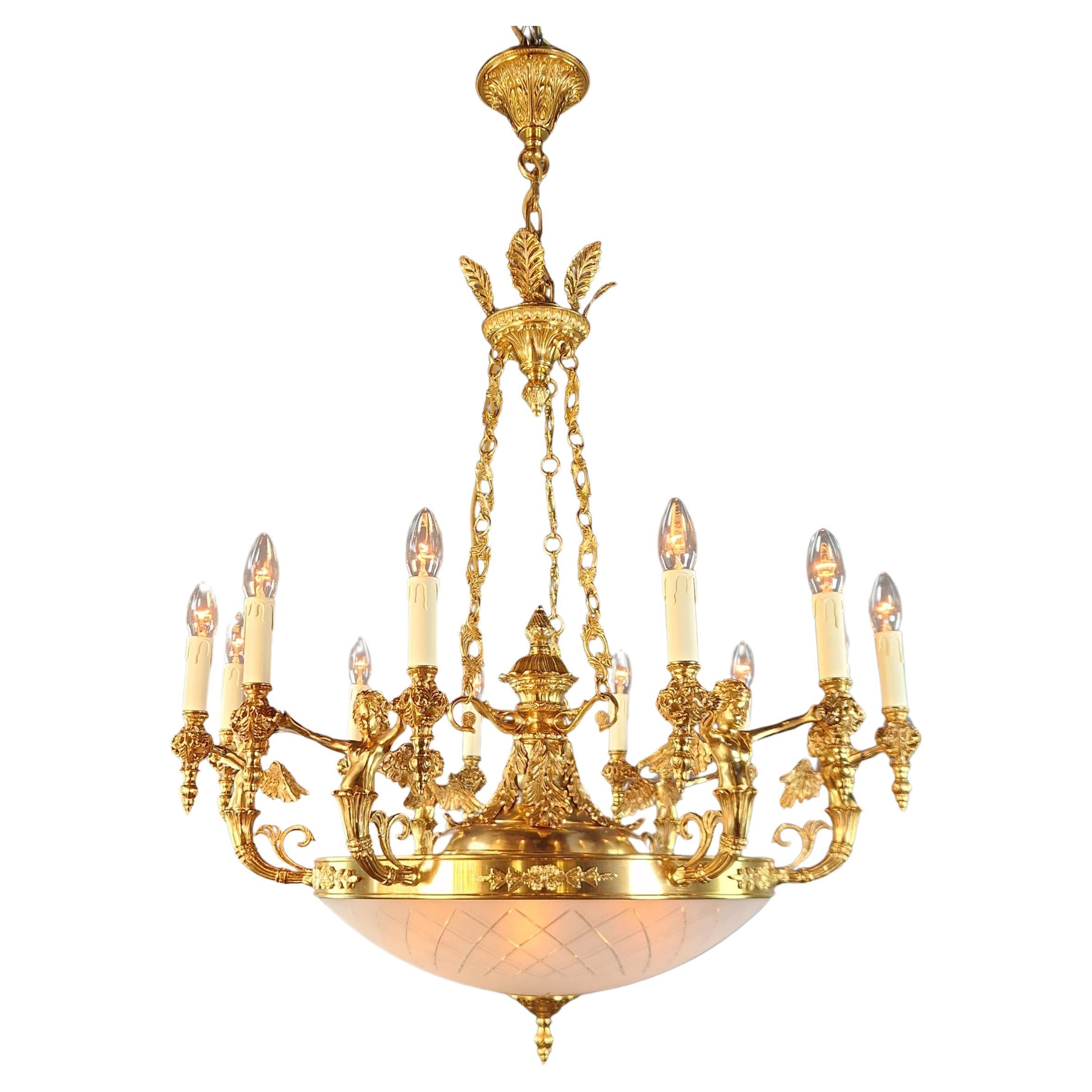 Introducing a stunning Brass Baroque Empire Chandelier, reminiscent of the classical style of the Empire era. This is a new reproduction, and several are available, ensuring you can bring this classic beauty to your space.

Measuring a total height