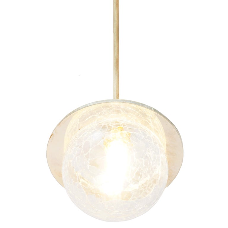 This pendant lamp is a contemporary object, made entirely by hand in Tuscany Italy, 100% of Italian origin.
A bright crystal 