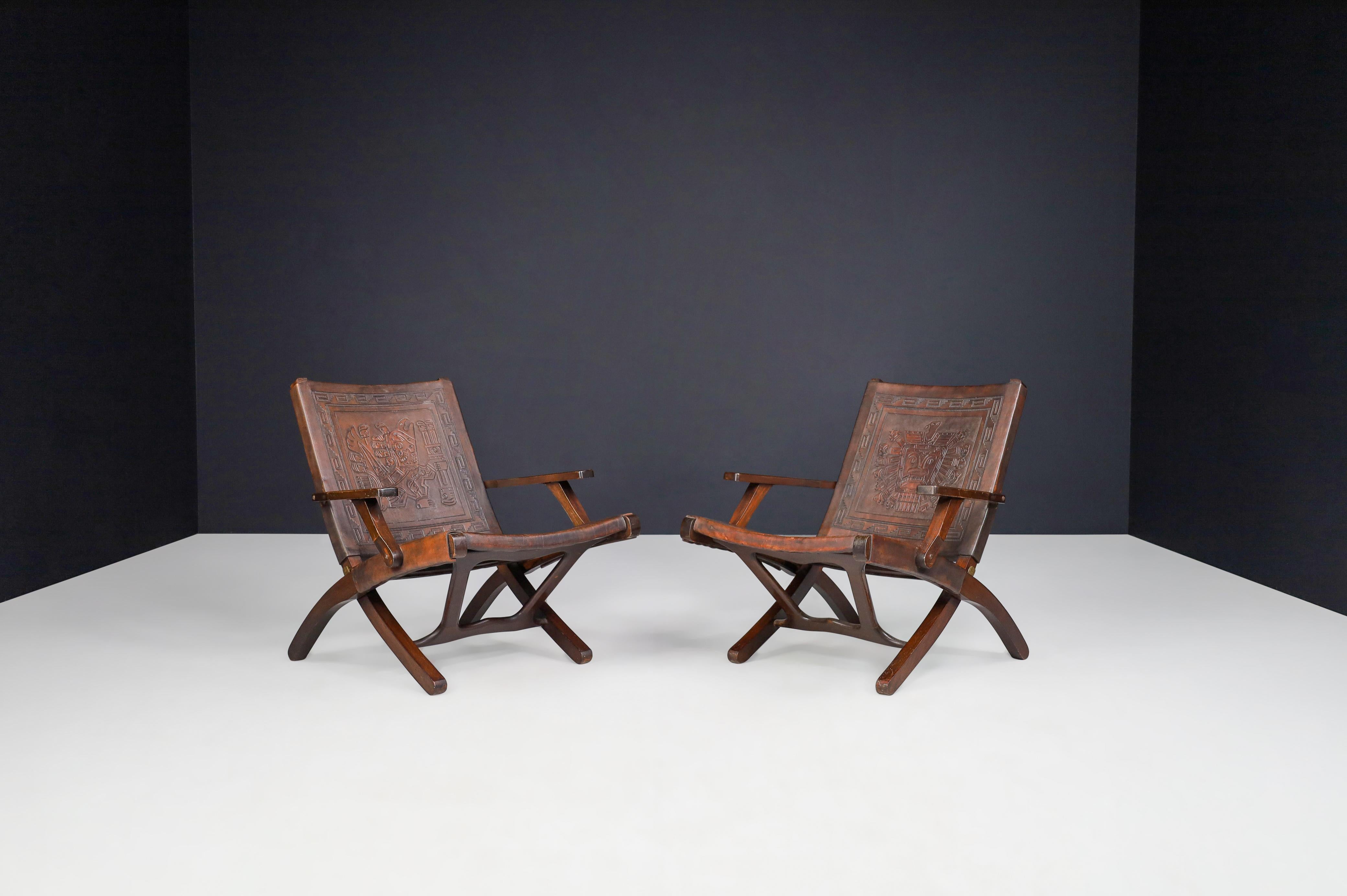 Ecuadorean Angel I. Pazmino Cognac-colored Saddle Leather Arm Chairs Ecuador 1970s   For Sale