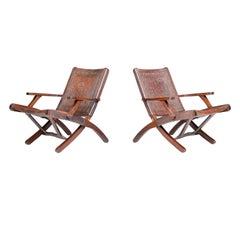 Angel I. Pazmino Cognac-colored Saddle Leather Arm Chairs Ecuador 1970s
