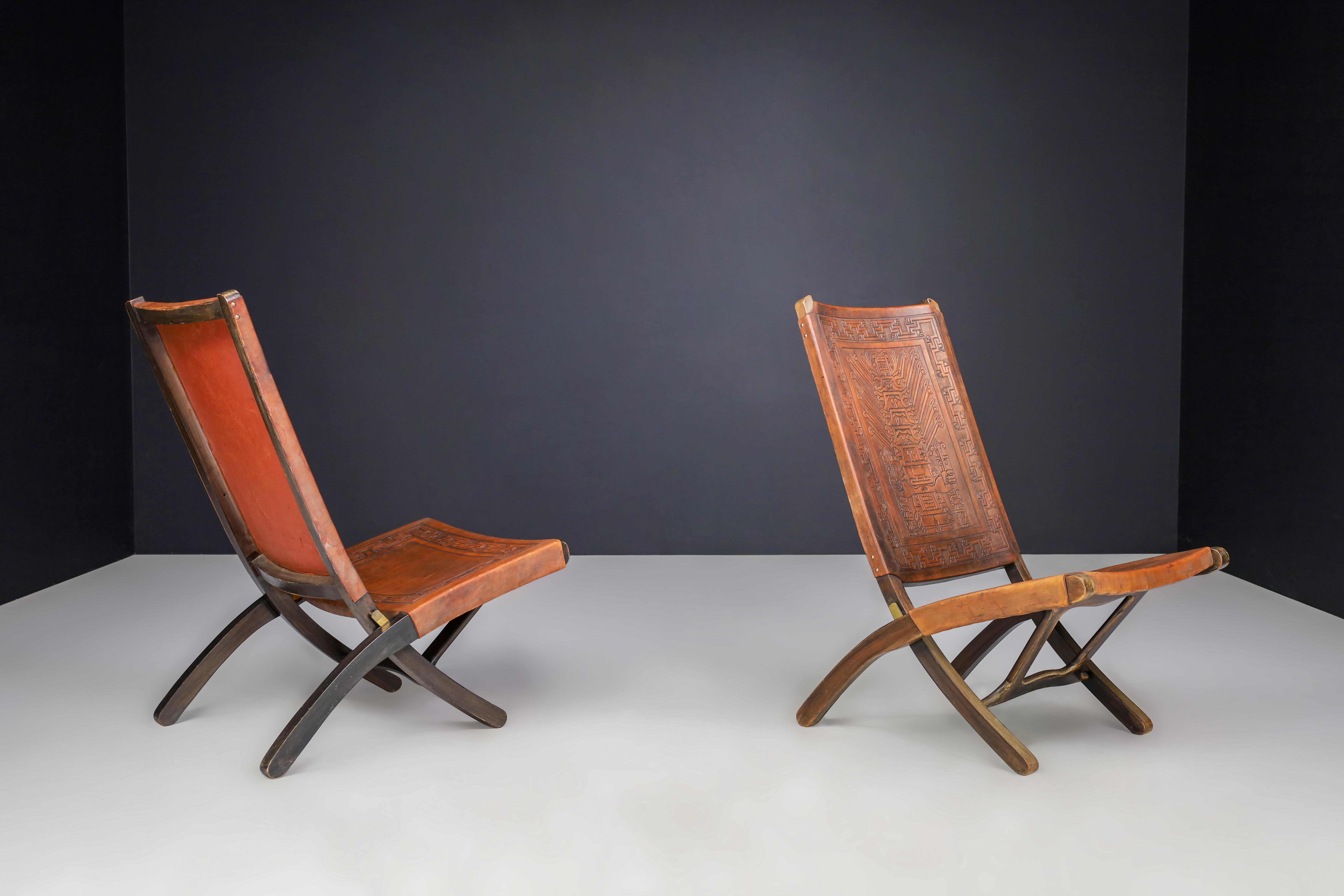 Ecuadorean Angel I. Pazmino Cognac-colored Saddle Leather Folding Chairs Ecuador 1970s   For Sale