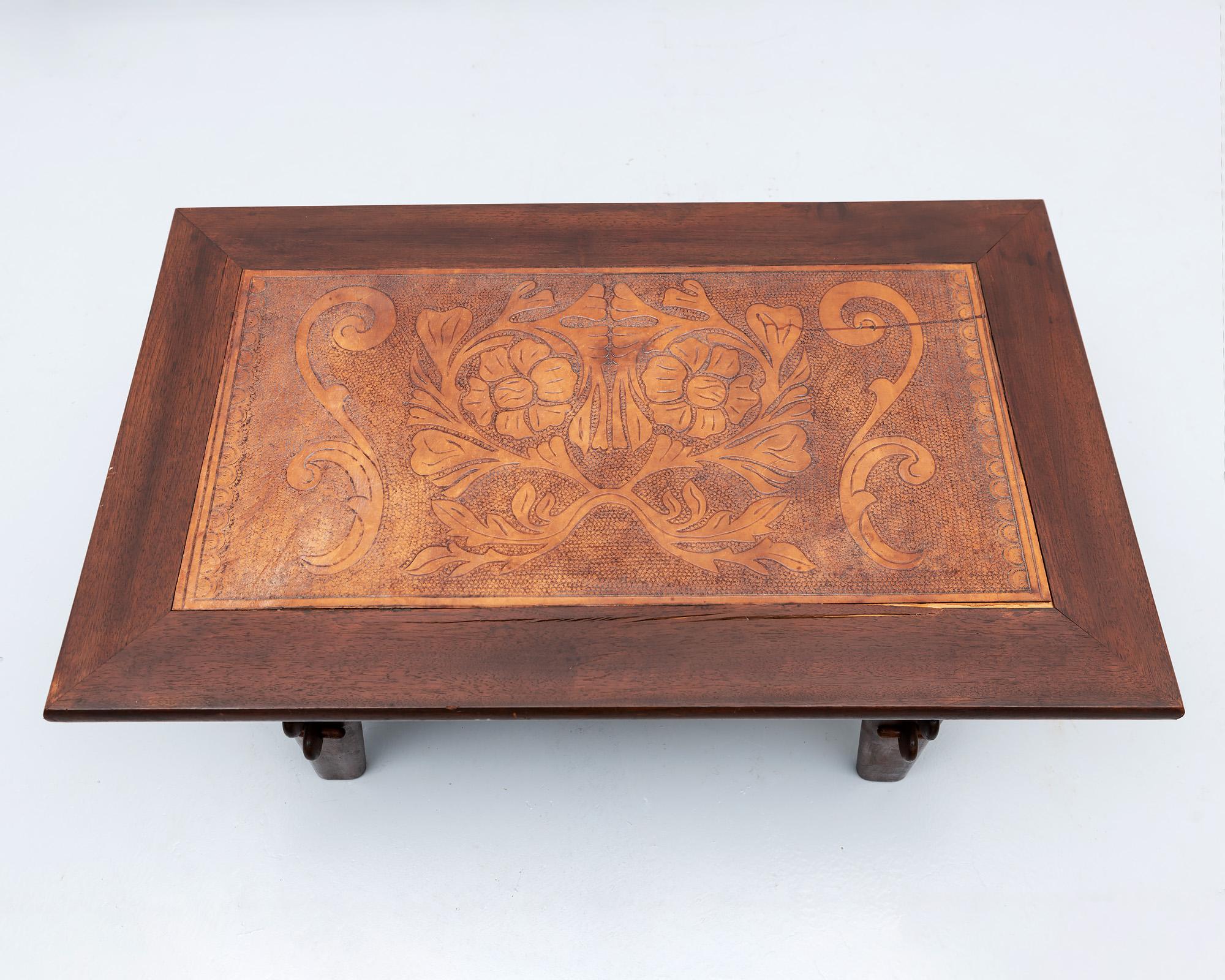 Lovely side table in rosewood and hand-tooled leather by Angel Pazmino for Muebles de Estillo, Ecuador, 1960s.