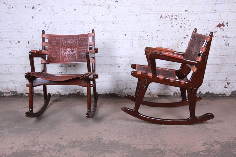 Angel Pazmino Ecuadorian Wood and Leather Rocking Chairs, Pair at 1stDibs