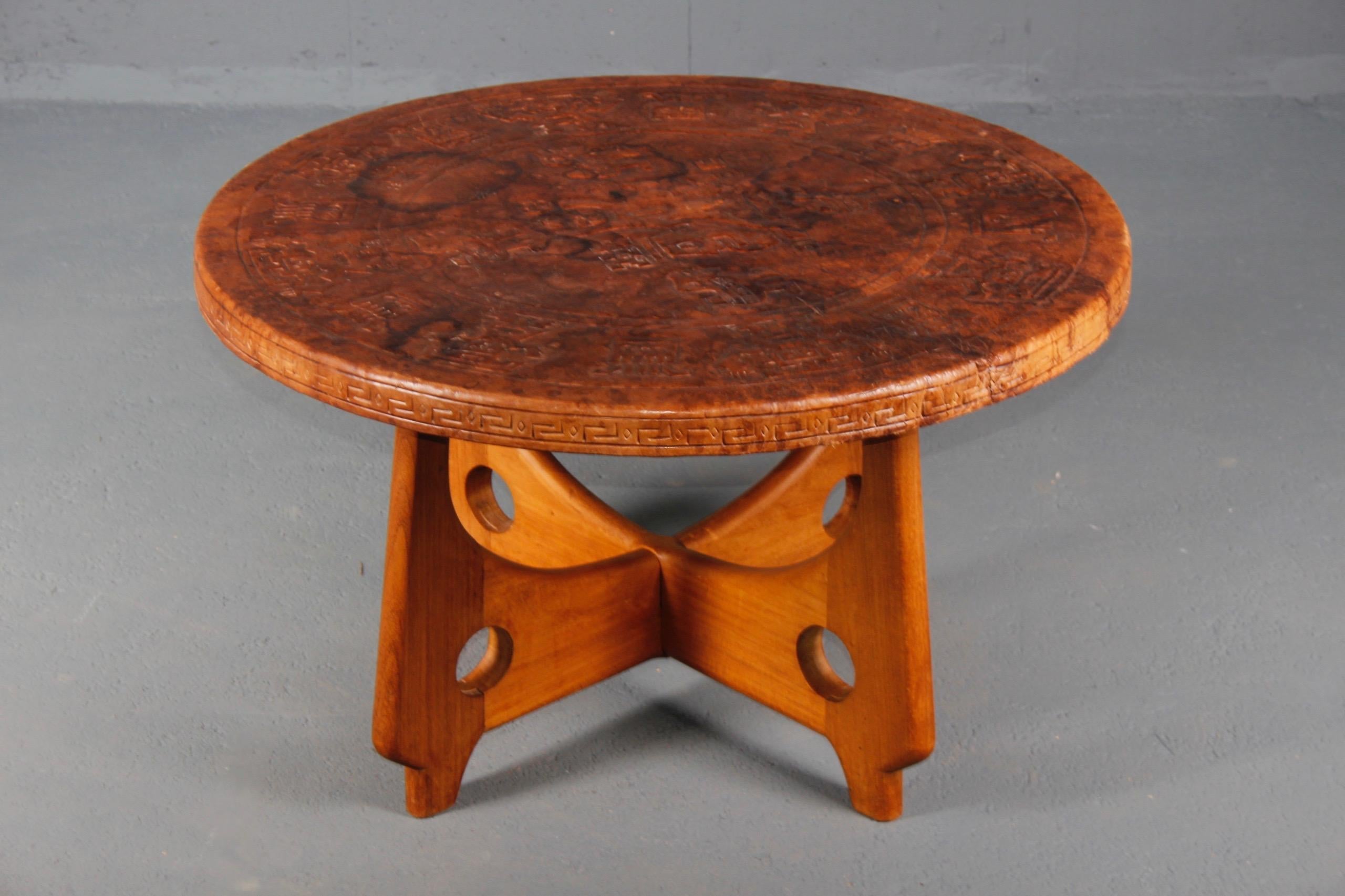 Angel Pazmino leather and wood organic coffee table.