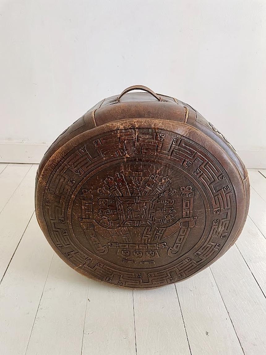 Mid-Century Modern Angel Pazmino Low Brown Leather Pouf Ottoman Mayan Tooled Relief Ecuador, 1960s