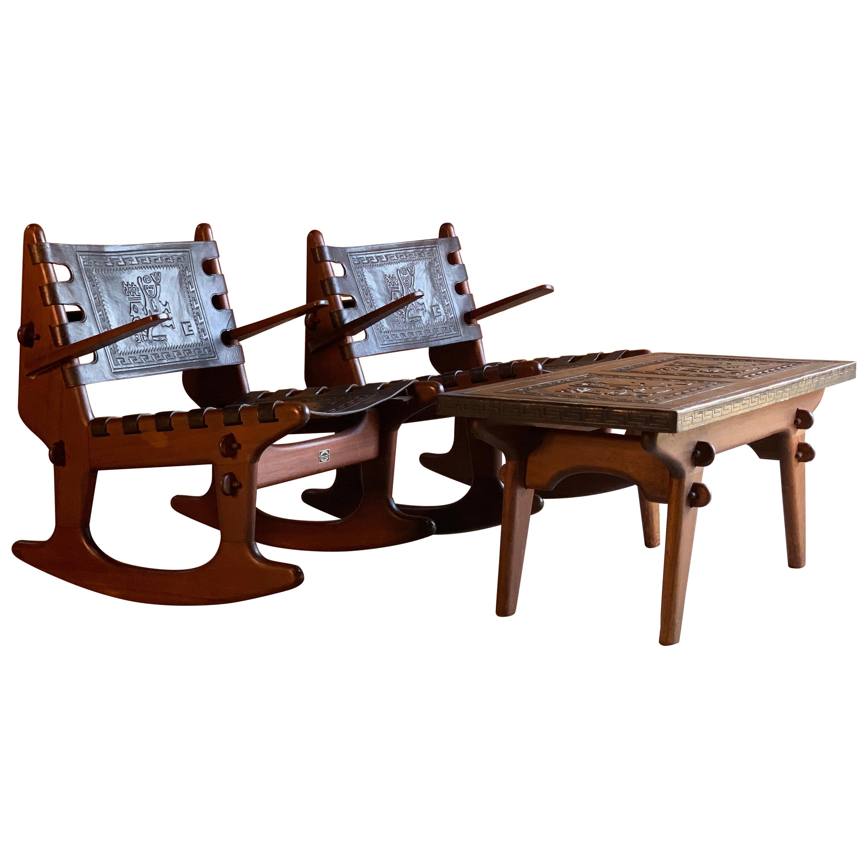 Angel Pazmino rocking chairs and coffee table teak and leather Ecuador, 1960

Extremely rare mid-20th century South American coffee table and matching rocking chairs, designed by Angel Pazmino, the rocking chairs with solid teak frames, peg
