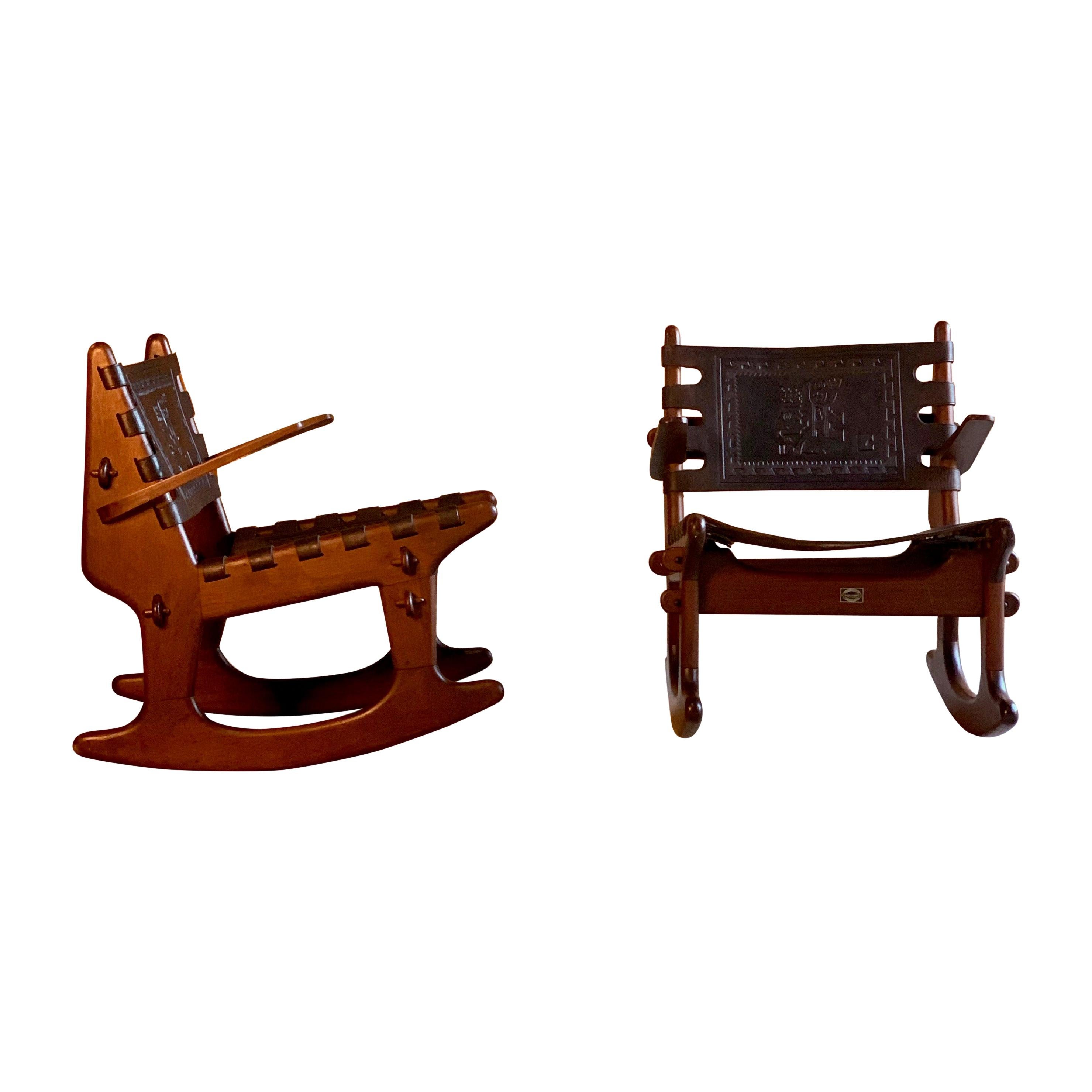 Angel Pazmino rocking chairs and coffee table teak and leather Ecuador, 1960

Extremely rare mid-20th century South American coffee table and matching rocking chairs, designed by Angel Pazmino, the rocking chairs with solid teak frames, peg