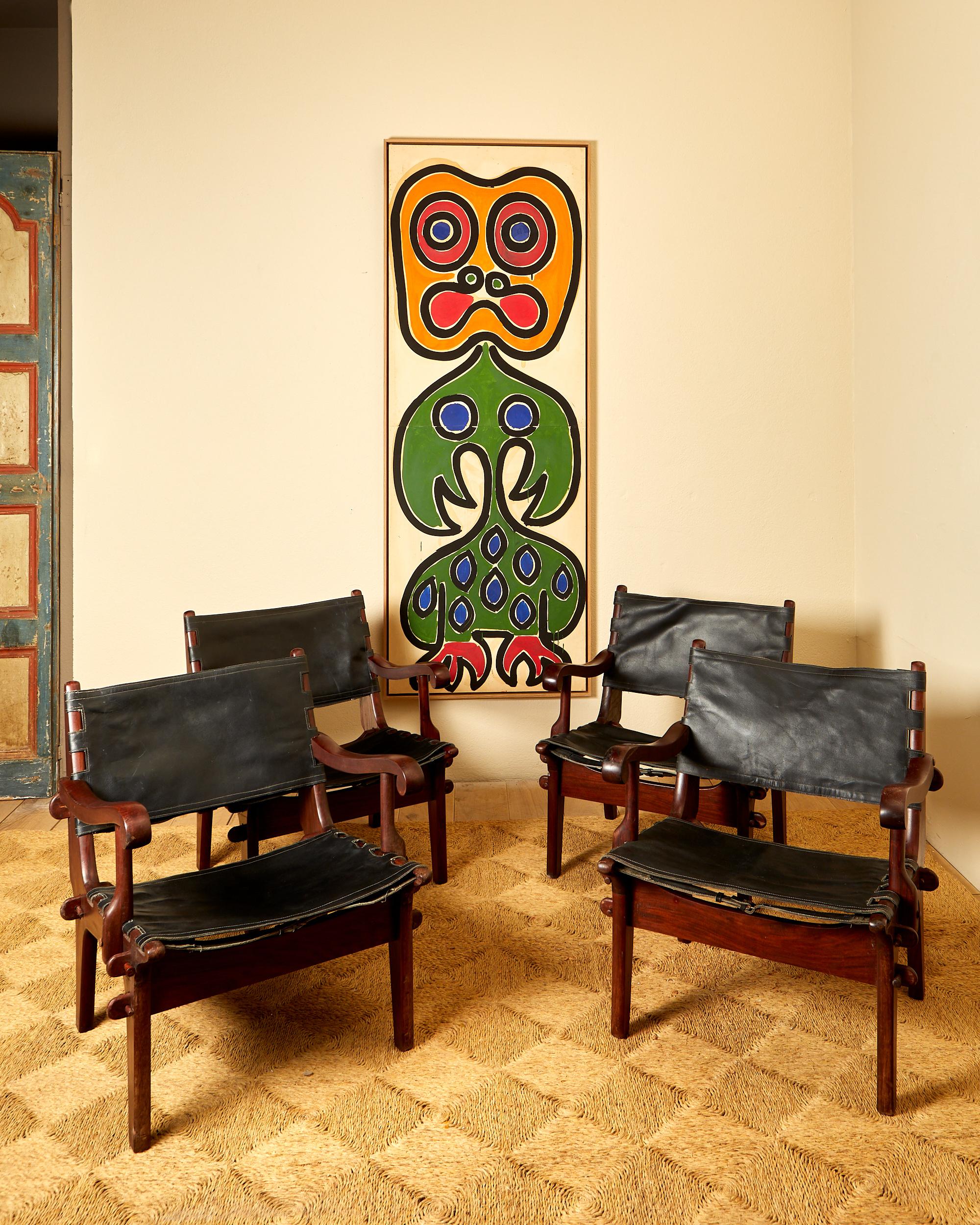 Modern Angel Pazmino, Suite of four armchairs, leather and wood, circa 1960, Ecuador. For Sale