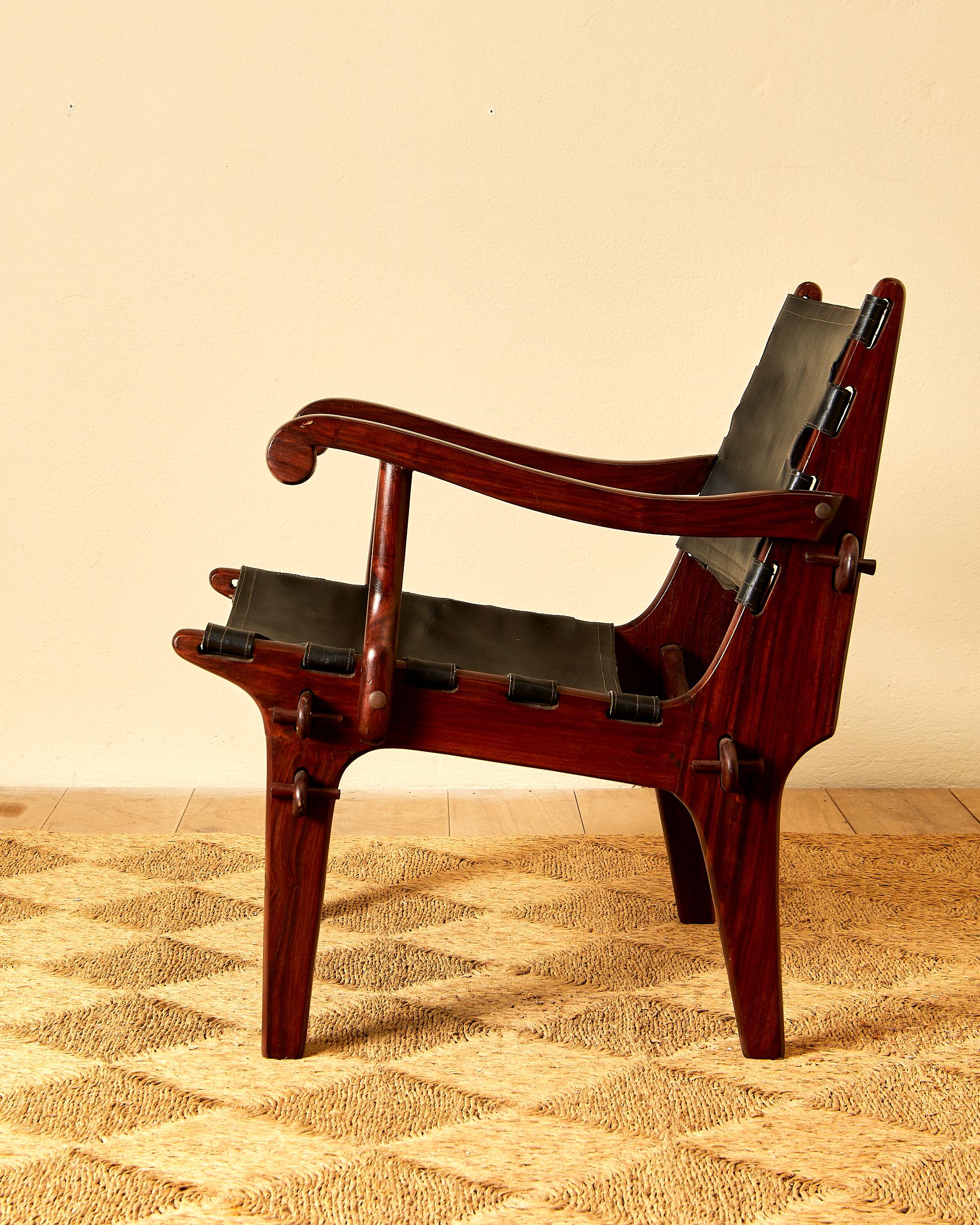 Leather Angel Pazmino, Suite of four armchairs, leather and wood, circa 1960, Ecuador. For Sale