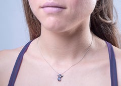 Angel Pendant Necklace 18Kt White Gold with a Very Peri Pear and Round Iolite