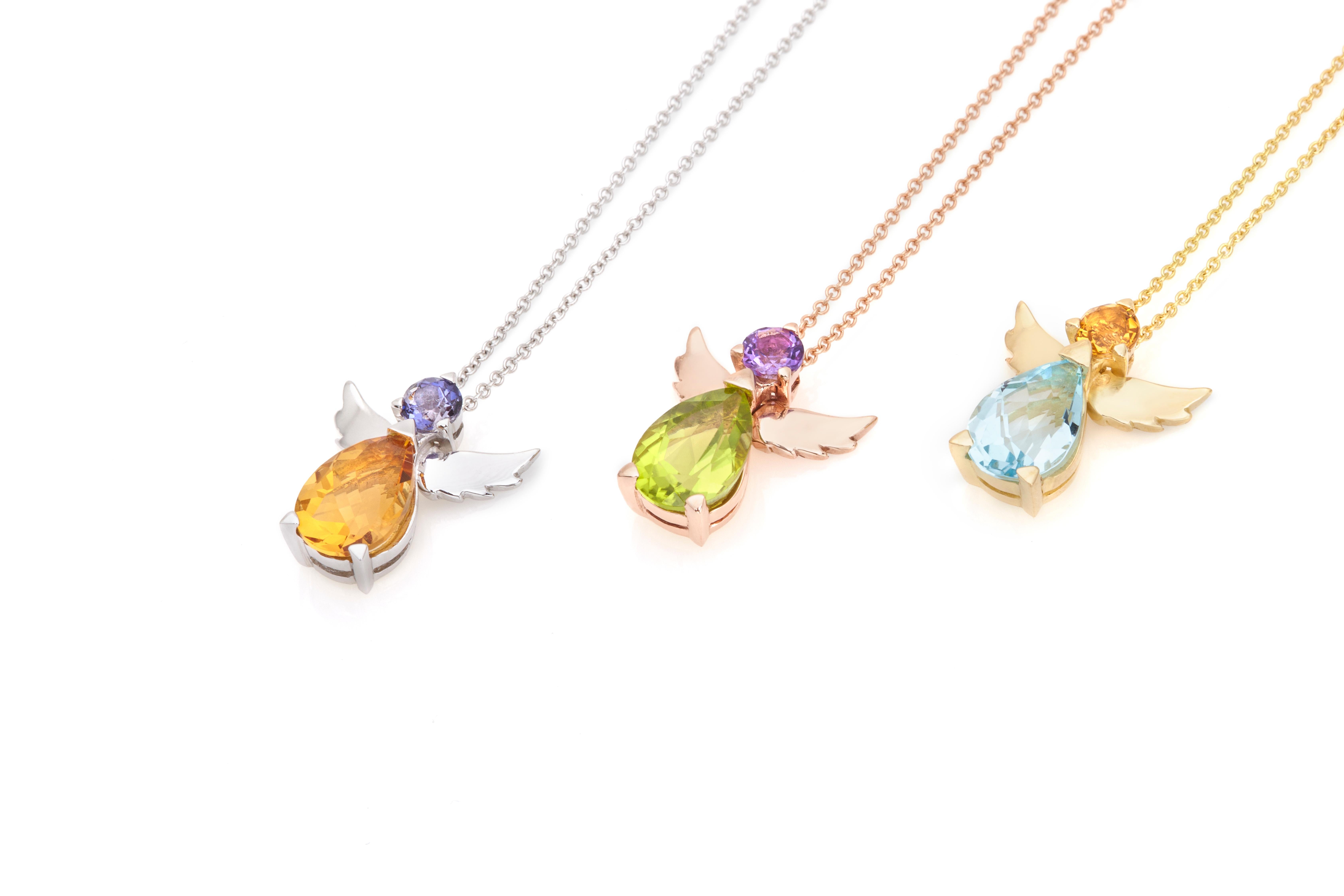 Guardian Angel Pendant Necklace in 18kt Rose Gold with Round Purple  Αmethyst and Pear Green Peridot.
The angel is made of 18Kt rose gold, purple amethyst and green peridot. It comes with an 18Kt rose gold rolo chain, 16 inches long. The pendant