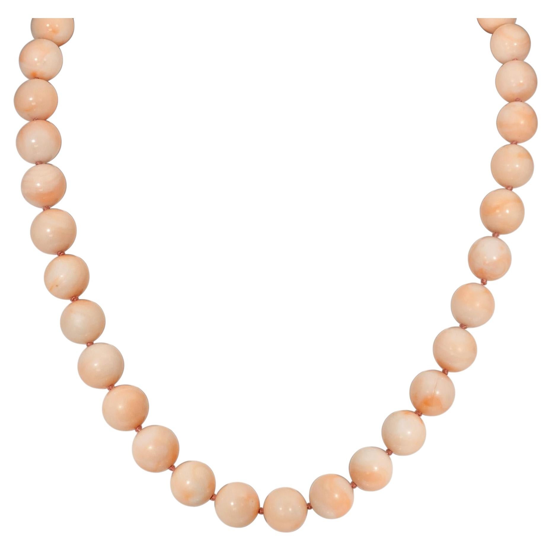 Angel skin coral bead and gold necklace