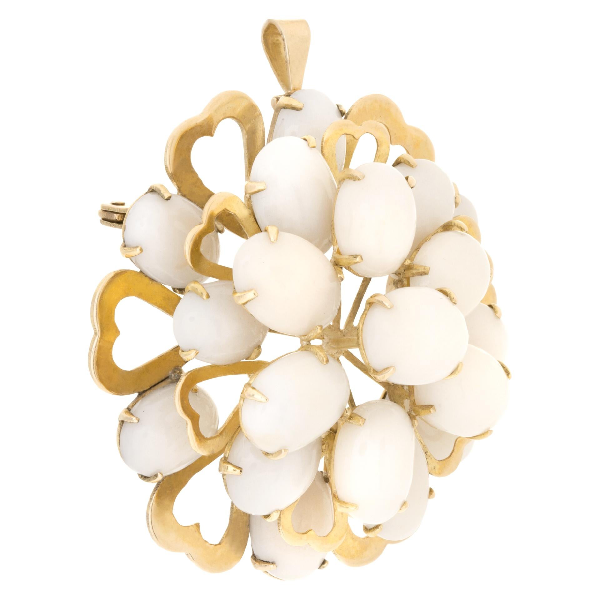 ESTIMATED RETAIL: $3,240.00   YOUR PRICE: $1,980.00
Flower shaped Angel-skin Coral bouquet pendant/brooch set in 14k yellow gold.