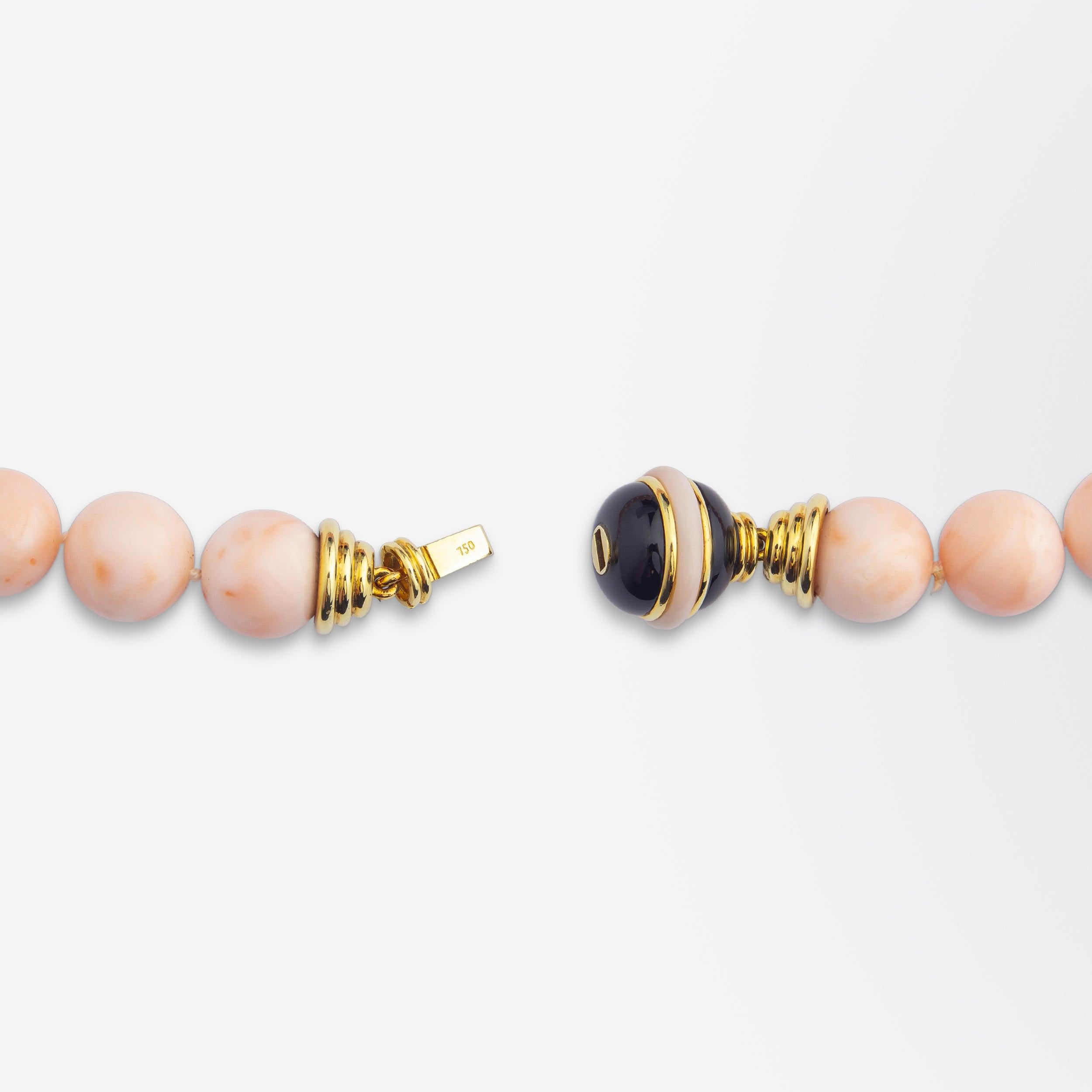 Uncut Angel-skin Coral Strand With Onyx & 18 Karat Gold Clasp For Sale