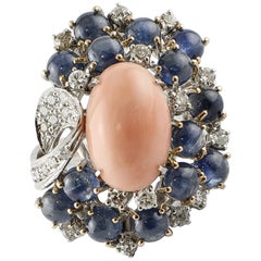 Oval Shape Pink Coral, Blue Sapphires, Diamonds, White Gold Enchanting Ring