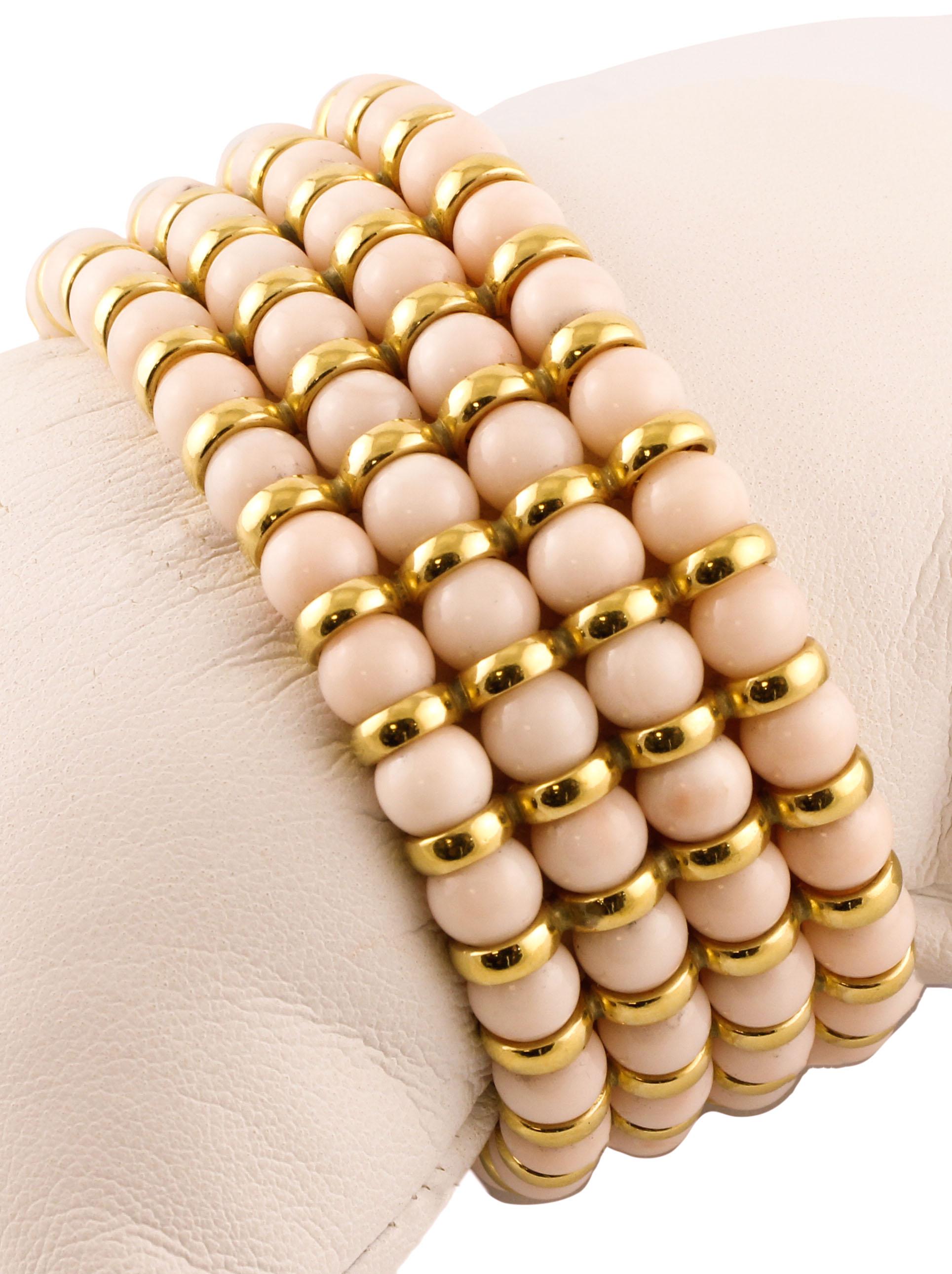 Amazing link bracelet composed of 4 rows of secundum angel skin pink coral spheres adoned with 18K yellow gold detailes between the spheres and simple and elegant at the same time closure in 18K yellow gold.
Angel Skin Pink Coral Spheres 39.60 g