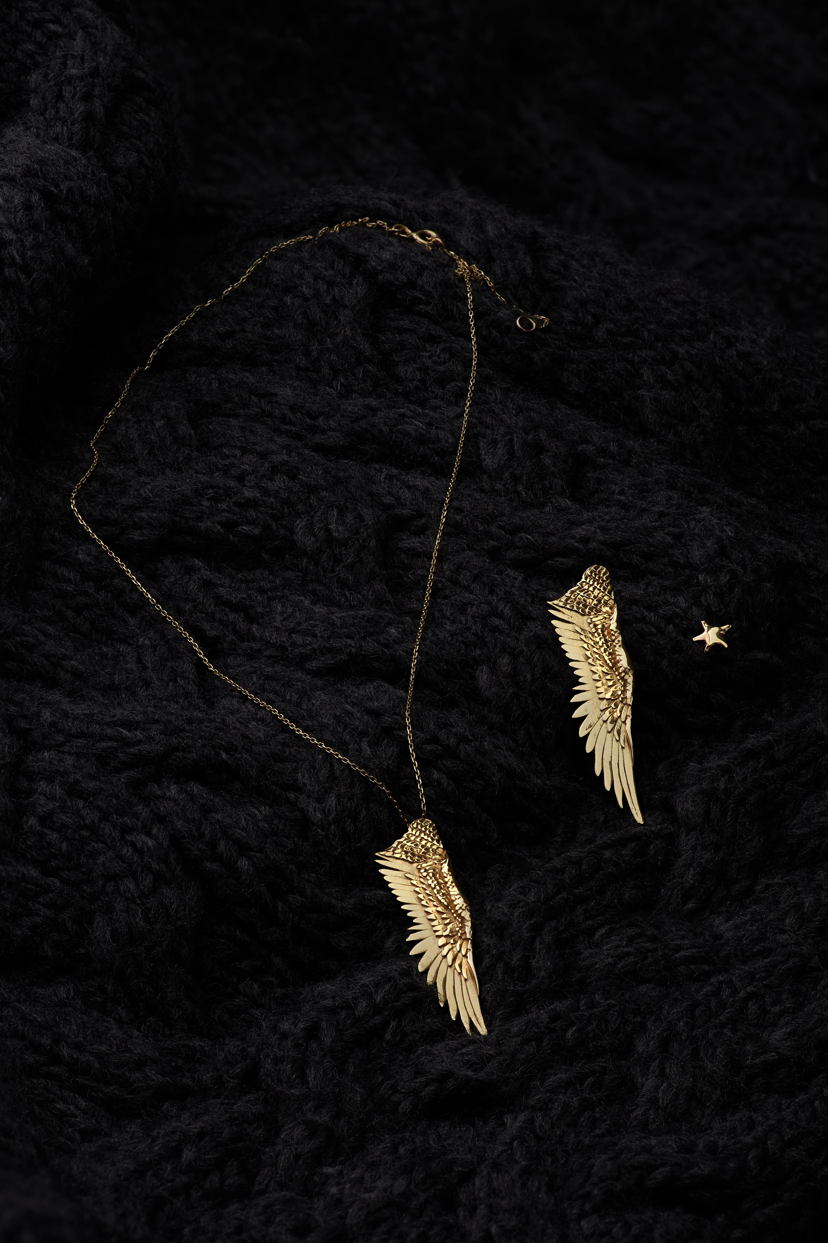 14k- Angel Wing Pendant Necklace

Adjustable chain 18-20 inches (45-51 cm) 
Handcrafted
