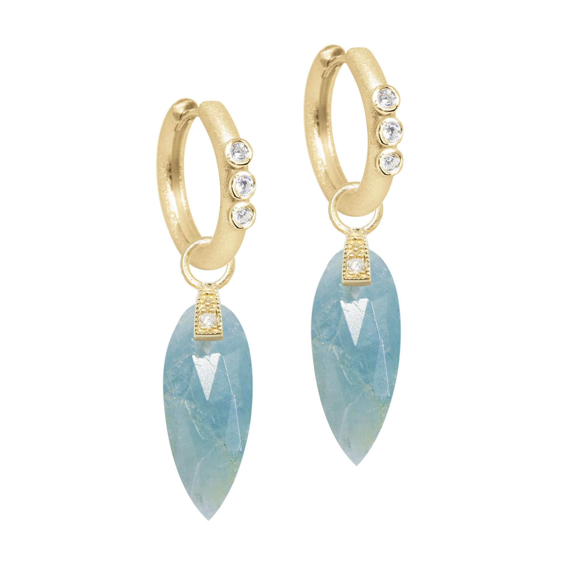 The perfect everyday style, the Angel Wings 20mm Gold Charms feature milky lapis drops dangling from a diamond-studded bale.


Nina Wynn Design's patent-pending earrings have an element on the back of the stud or charm to allow these pieces to