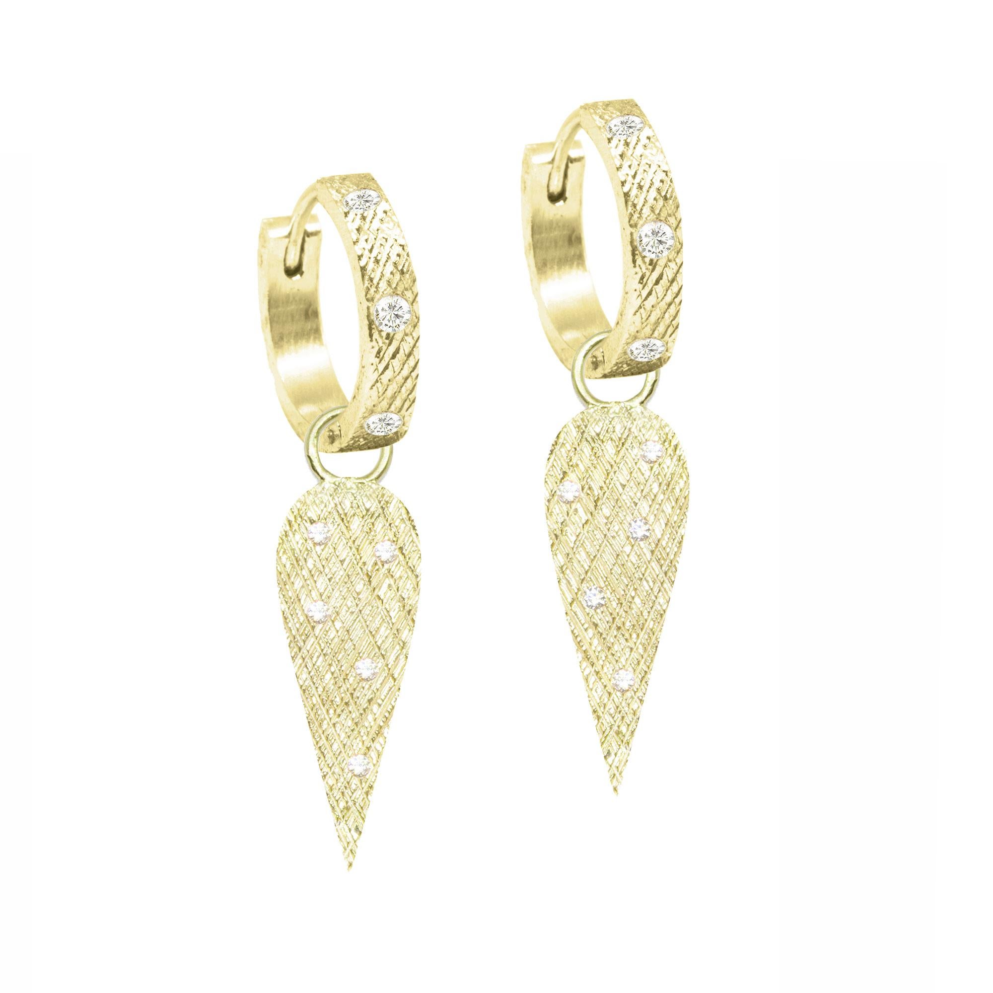 The perfect everyday style, especially when you want a subtle pop of color, the Angel Wings 20mm Gold Charms scatter diamonds on a rich gold background detailed with a feather-like crosshatch pattern.

Hoops and charms are sold separately. PICK YOUR