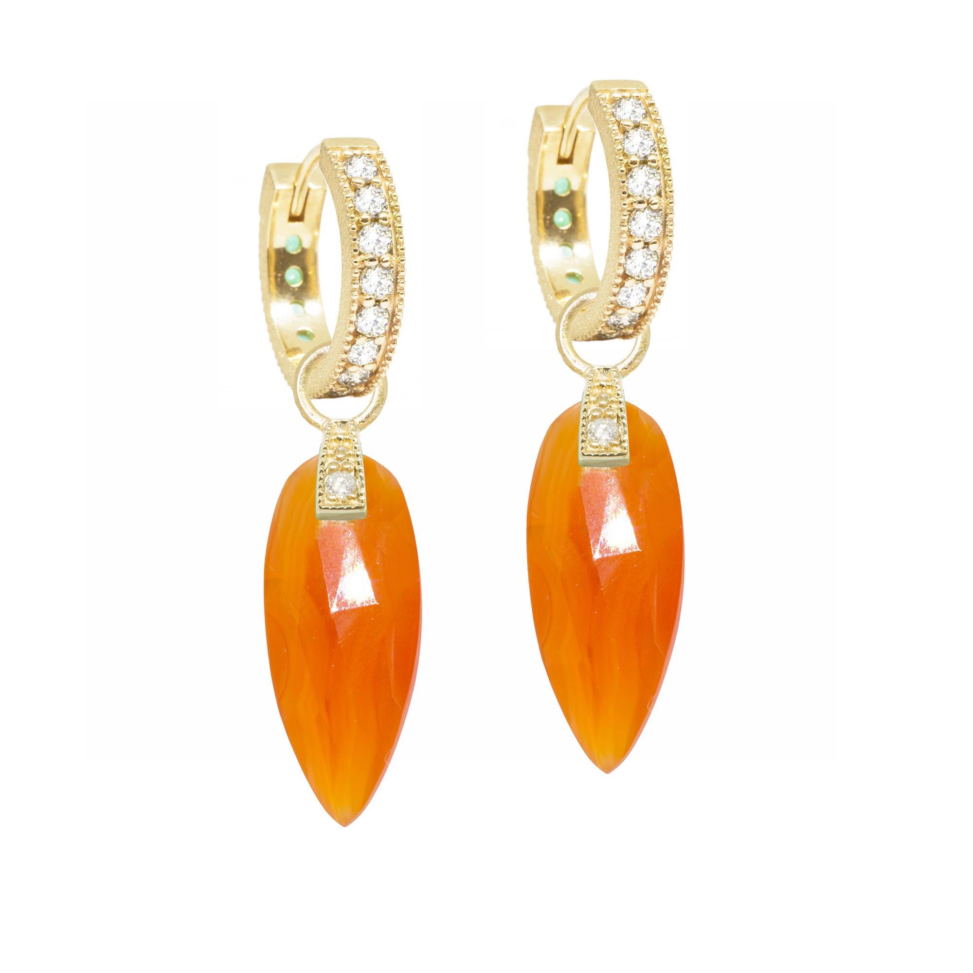 The perfect everyday style, the Angel Wings 20mm Gold Charms feature carnelian drops dangling from a gemstone-studded bale.

Nina Nguyen Design's patent-pending earrings have an element on the back of the stud or charm to allow these pieces to