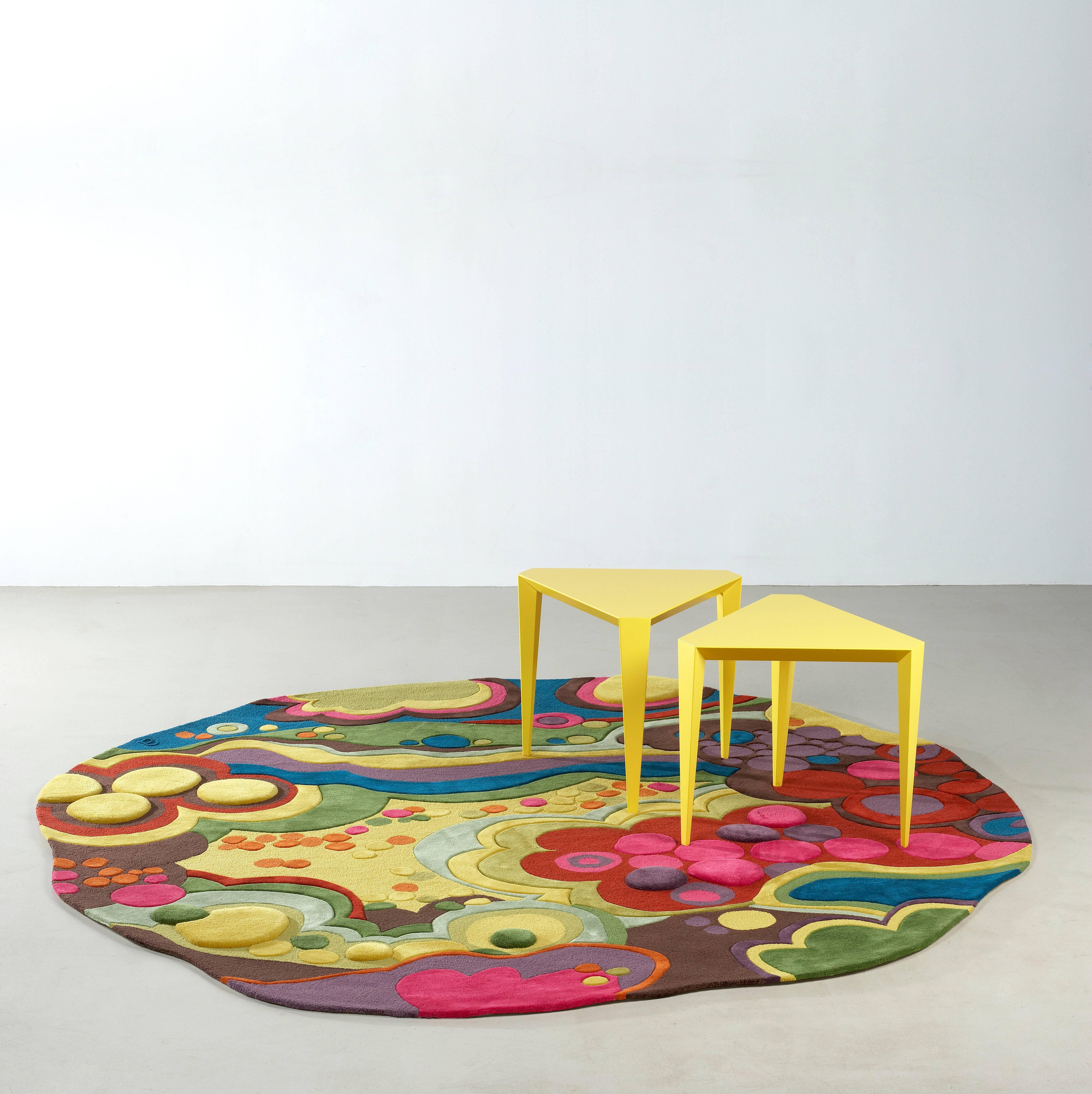 The Angela Adams Garden area rug is an energetic design bursting with the bold colors and textures of a garden in full bloom.

Hand-tufted in 100% pure New Zealand wool. Every Angela Adams rug is ethically and responsibly handmade by skilled