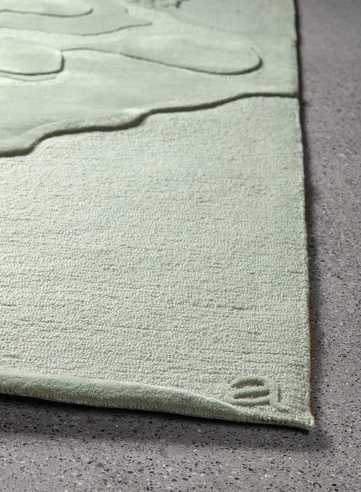 The Nebula area rug by Angela Adams is inspired by the clouds of dust and gas that exist in outer space, forming shapes that mimic the moon's surface.

Featuring a plush and luxurious pile, this design is hand carved, tufted and sculpted in 100%