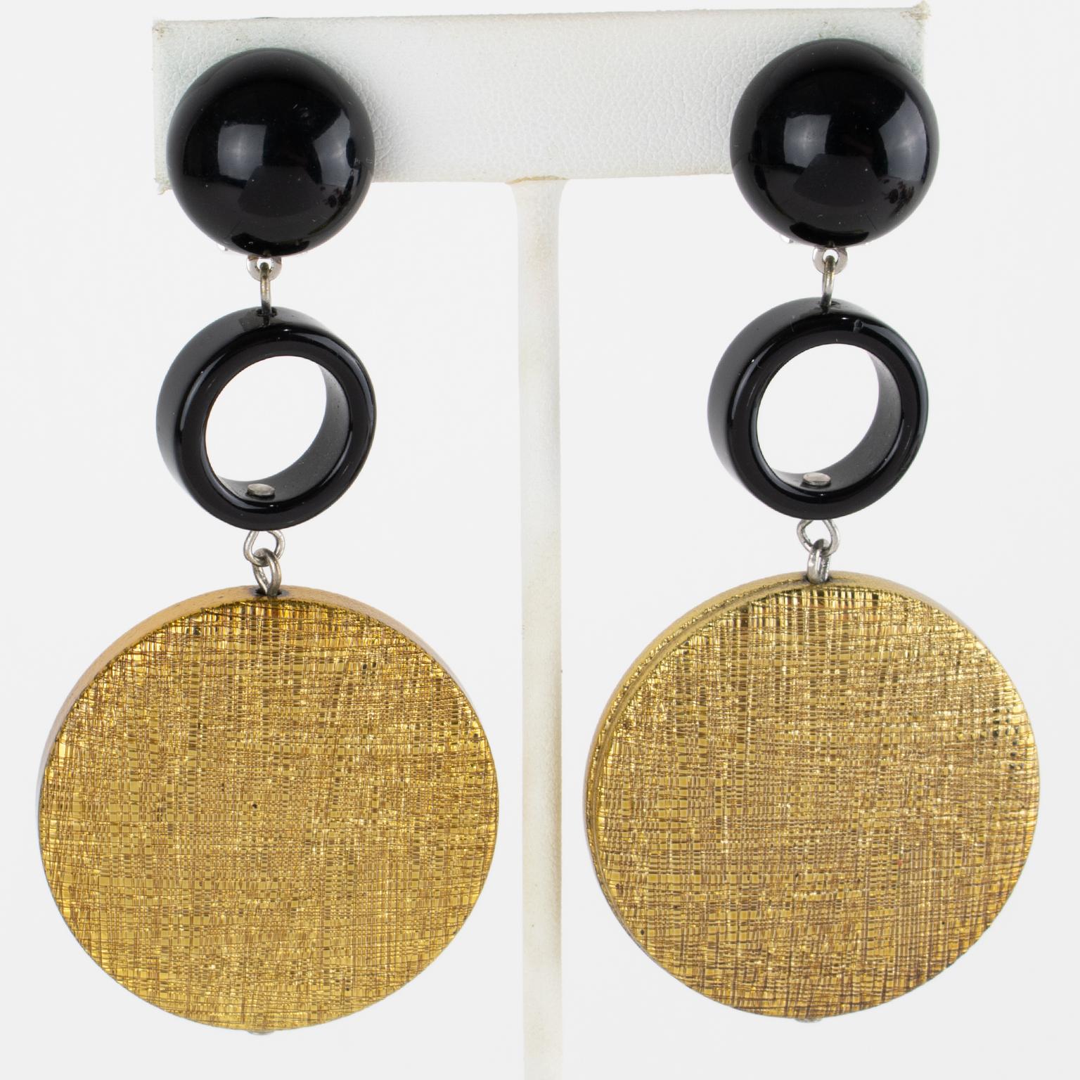 Angela Caputi - Boucles d'oreilles clip à disque en résine noire et dorée Unisexe en vente