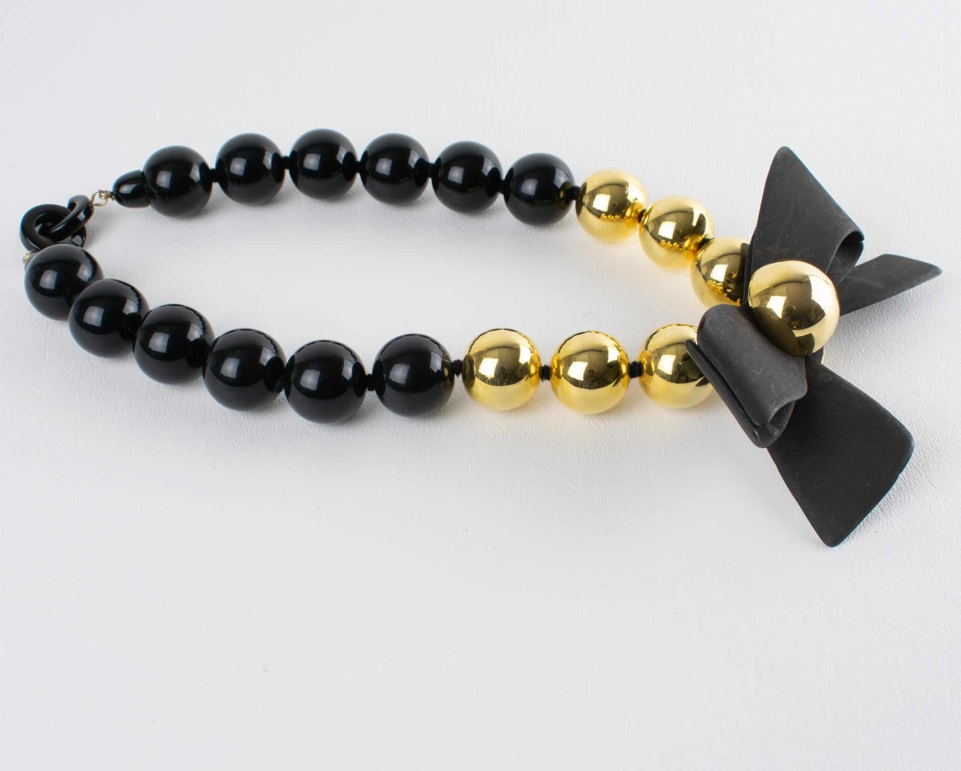 Women's or Men's Angela Caputi Black and Gold Resin Necklace with Oversized Bow
