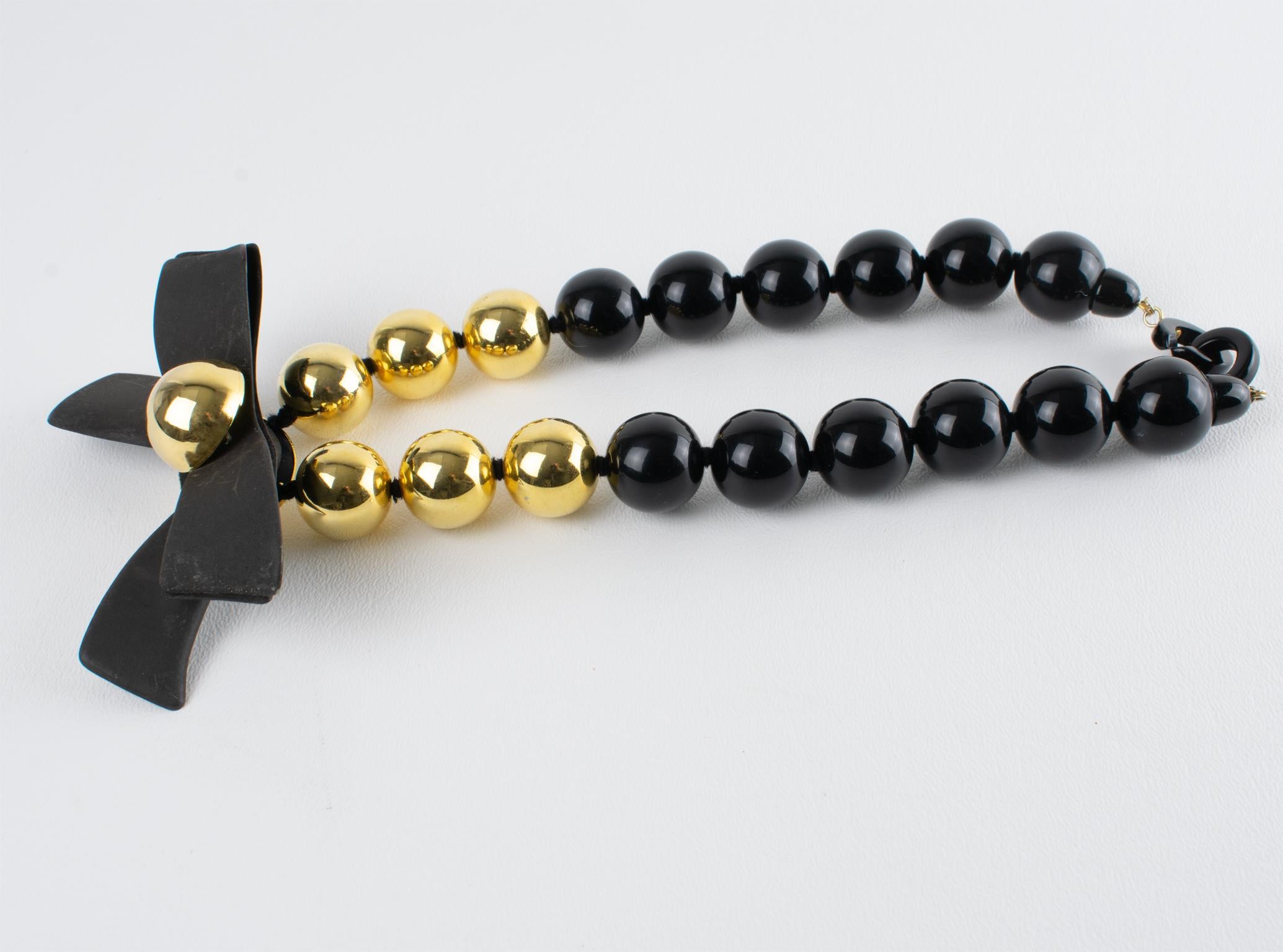 Angela Caputi Black and Gold Resin Necklace with Oversized Bow 1