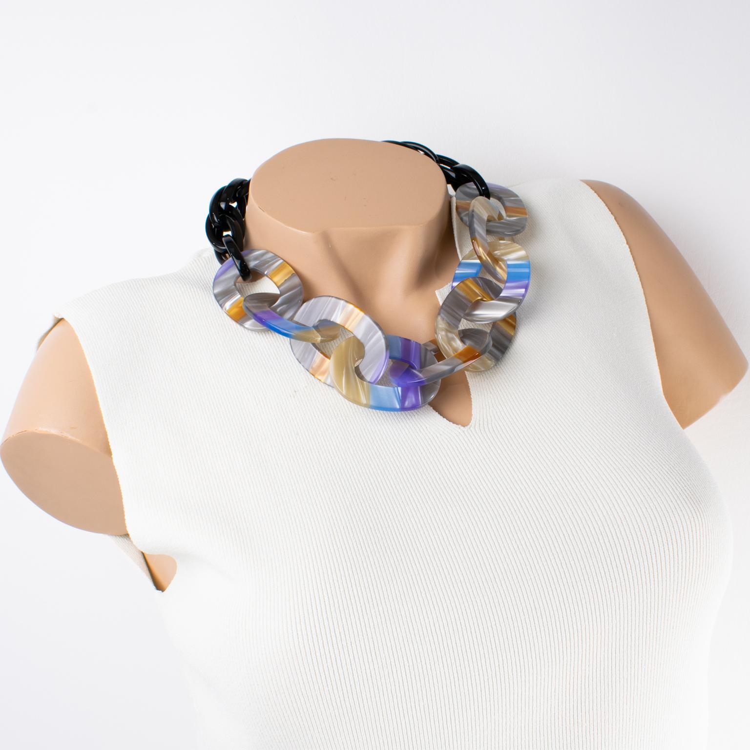 Angela Caputi designed this gorgeous, made-in-Italy acrylic resin or lucite choker necklace. The around-the-neck shape features a thick black resin chain, contrasted with extra-thick ovoid links in a pearlized multicolor tone. The piece has the