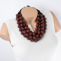 Angela Caputi Black and Red Cinnabar Multi-Row Resin Necklace and Floral Carving