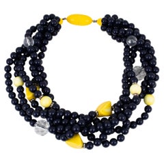 Collier ras du cou en résine multibrins noire et jaune Angela Caputi