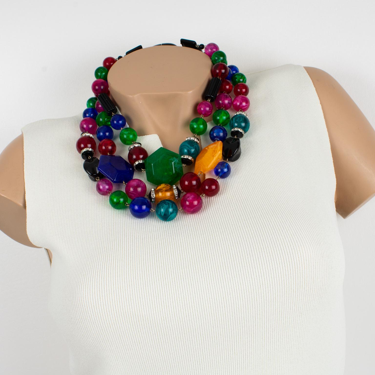 Superb Angela Caputi, made in Italy resin choker beaded necklace. Features a fruit salad beads multi-strand design with contrasting black beads and tiny crystal rhinestones spacer beads. 
A large selection of assorted colors in navy blue, emerald