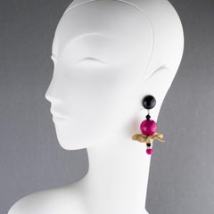 Angela Caputi Orecchini a clip floreali in resina con polvere d'oro e fucsia