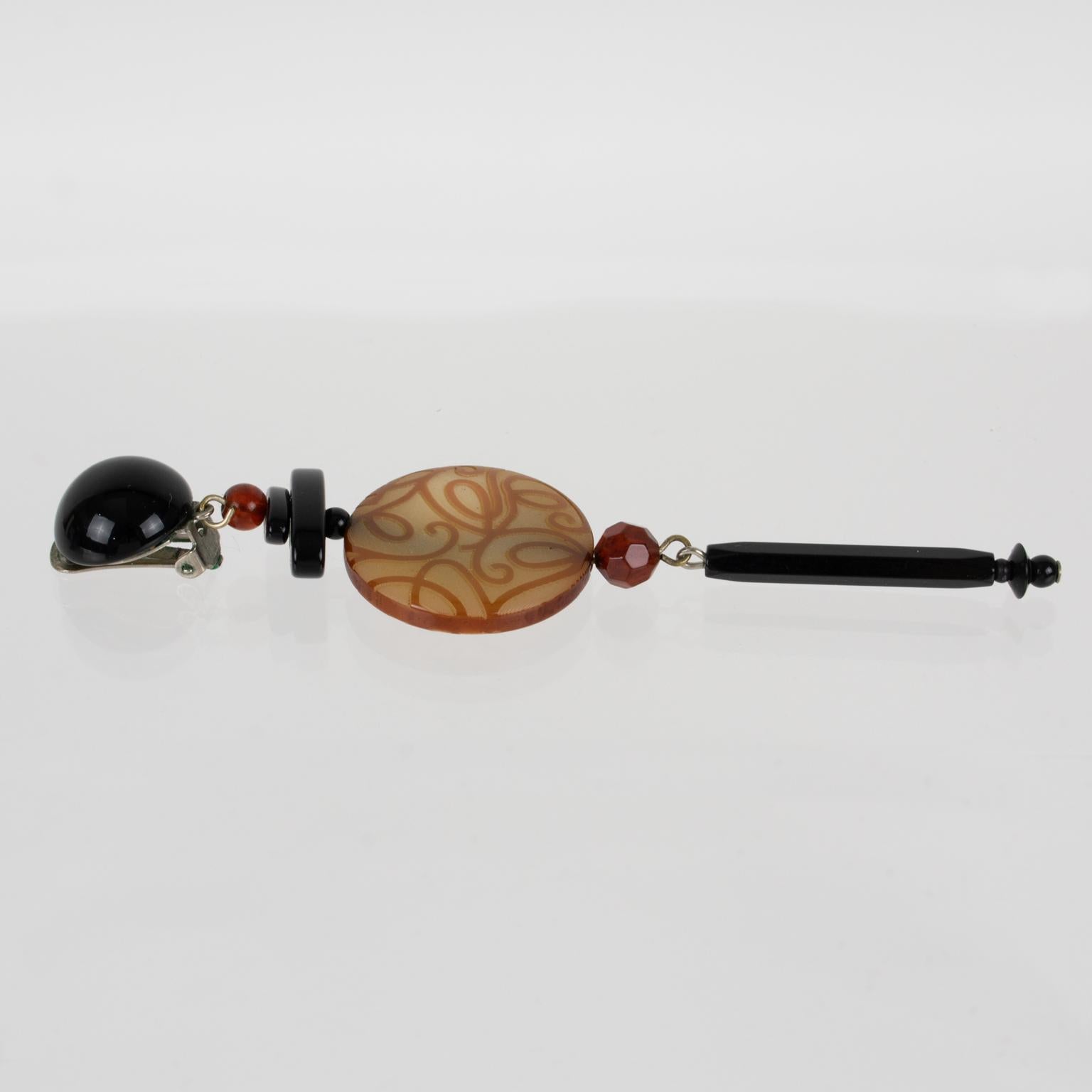 Women's or Men's Angela Caputi Honey and Black Dangle Resin Earrings Arabesque Design For Sale