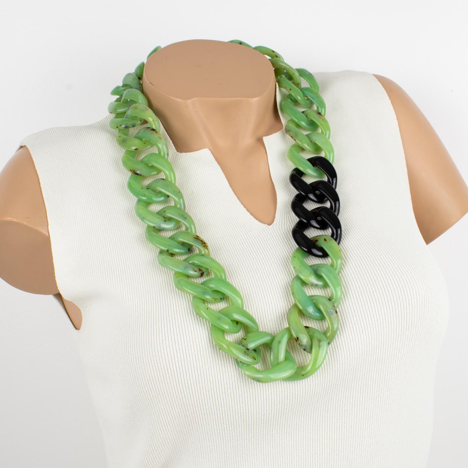 This lovely Angela Caputi, made-in-It Italy long necklace features an extra-large flat resin chain design in green marble color with a black contrast. Her matching of colors is always bold and classy.
As you know, Caputi jewelry is not signed. This