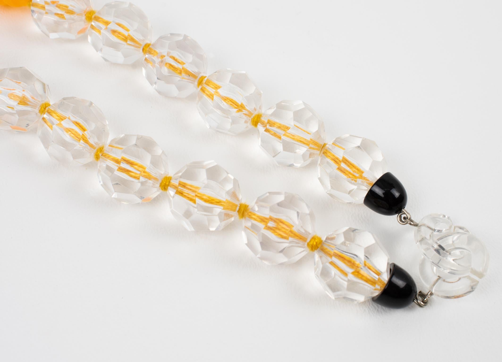 Angela Caputi, collier ras du cou en résine orange avec perles facettées 4