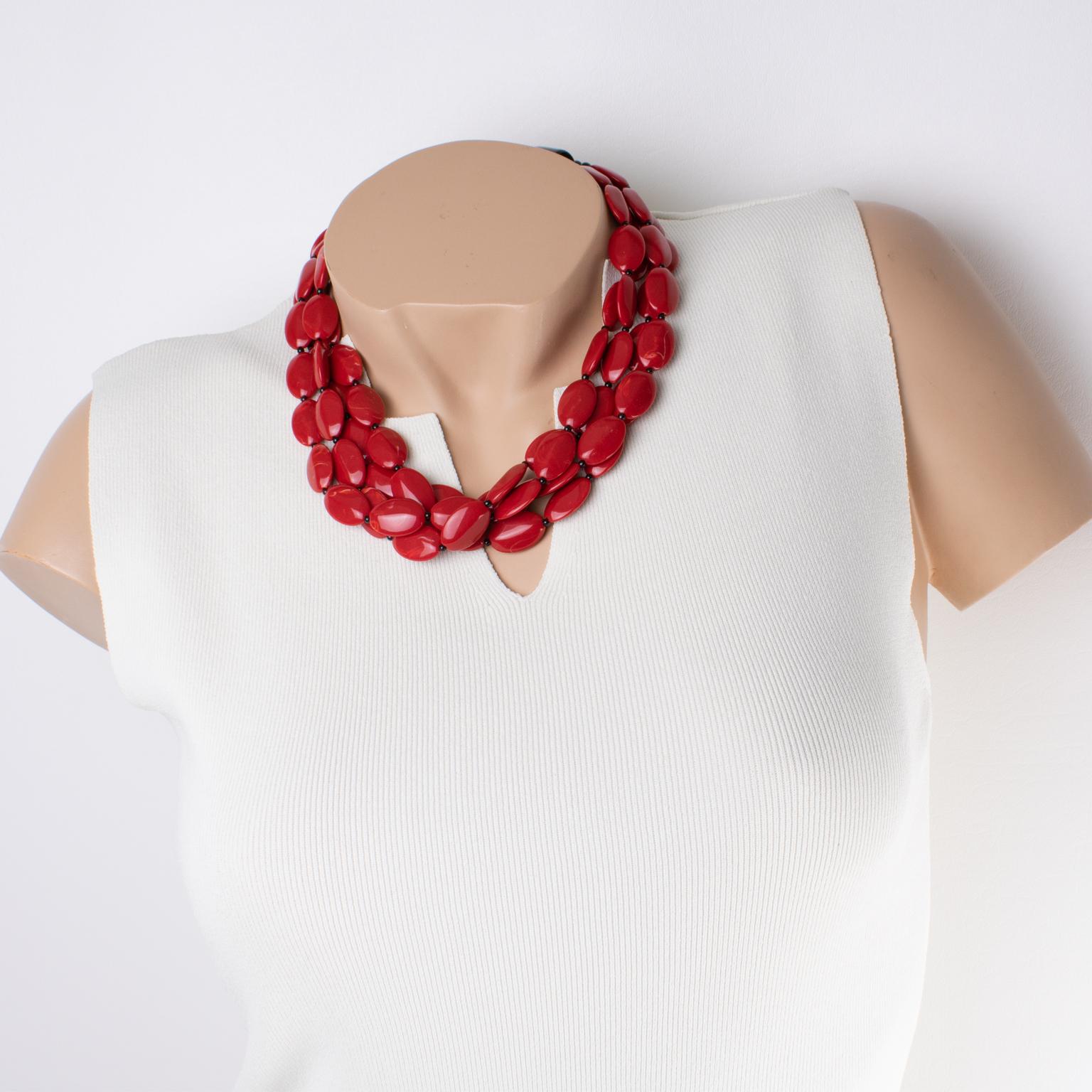 This superb Angela Caputi resin choker necklace, made in Italy, features a multi-strand design in lovely red cinnabar and black. The flat and slightly domed rounded pebbles form four cascading rows. Her color matching is always extremely classy,