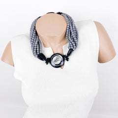 Collier ras du cou en résine gris et noir multibrins Angela Caputi