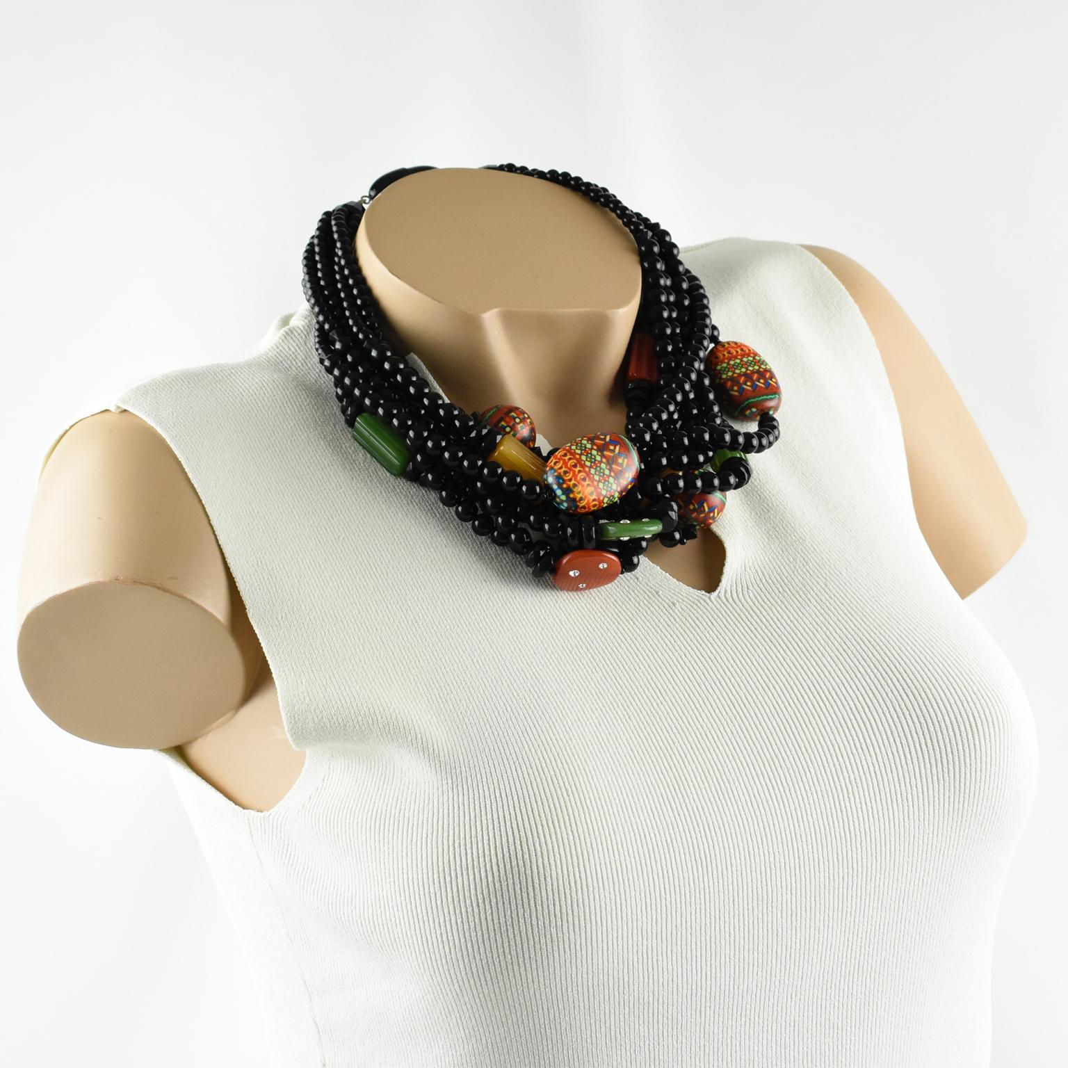Superb Angela Caputi, made in Italy resin choker beaded necklace. Oversized fruit salad multi-strand design with dominant black color contrasted with green, beige, carrot orange, and tangerine resin pebbles beads, compliment with large multicolor